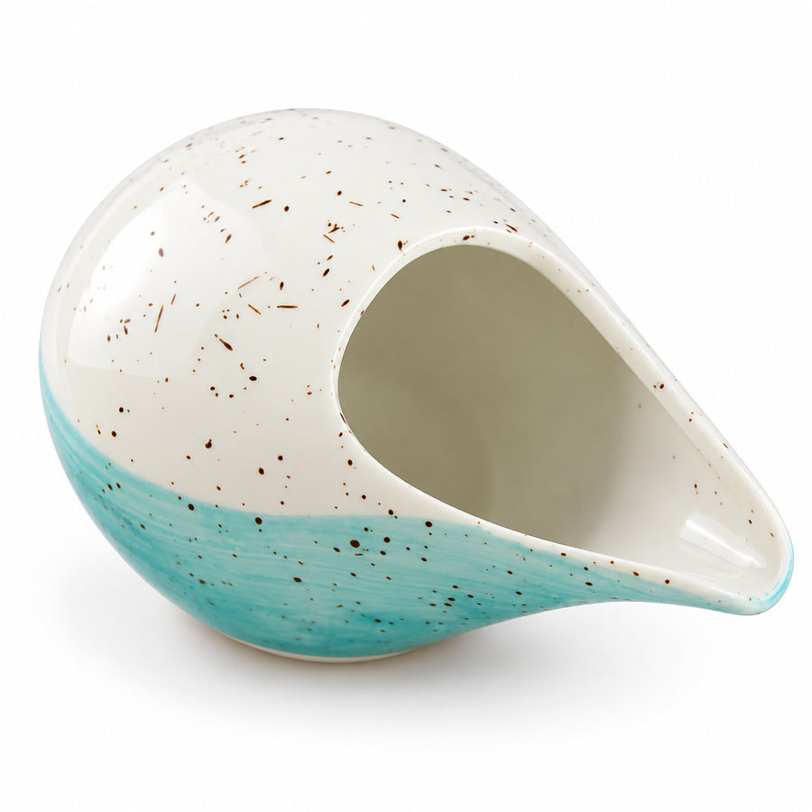 AI-assisted illustration of Lagoon Handleless Creamer, catalog three quarter view.