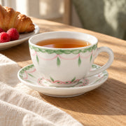 AI-assisted concept image of the botanical cup and saucer on a breakfast table; food and props are not included.