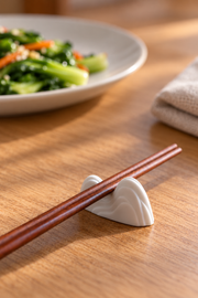 PUSU Mountain Porcelain Chopstick Rest — styled use illustration; props and additional pieces excluded 7; AI-assisted image