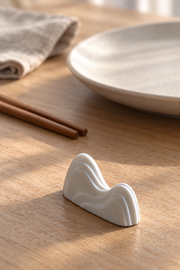 PUSU Mountain Porcelain Chopstick Rest — styled use illustration; props and additional pieces excluded 8; AI-assisted image