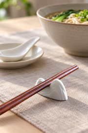 PUSU Mountain Porcelain Chopstick Rest — styled use illustration; props and additional pieces excluded 12; AI-assisted image