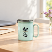 ZhangHongJi Celadon Infuser Mug — styled use illustration; props and additional pieces excluded 12; AI-assisted image