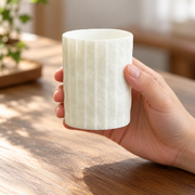 Shiwu Wanyi Folded Porcelain Tumbler — styled use illustration; props and additional pieces excluded 7; AI-assisted image