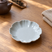 Yuanwu Petal Cup Rest — styled use illustration; props and additional pieces excluded 8; AI-assisted image