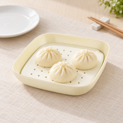 Cream Square Dish with Draining Insert — styled use illustration; props and additional pieces excluded 10; AI-assisted image