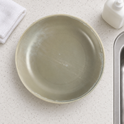 DXC Mist Gray Deep Serving Plate — styled use illustration; props and additional pieces excluded 8; AI-assisted image