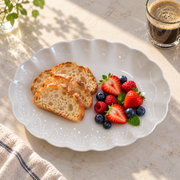 Scalloped White Bone China Oval Platter — styled use illustration; props and additional pieces excluded 9; AI-assisted image