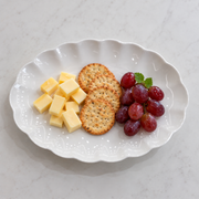 Scalloped White Bone China Oval Platter — styled use illustration; props and additional pieces excluded 10; AI-assisted image