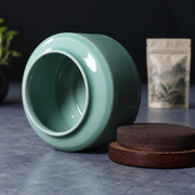 Shang Tang Celadon Tea Canister — styled use illustration; props and additional pieces excluded 8; AI-assisted image