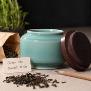 Shang Tang Celadon Tea Canister — styled use illustration; props and additional pieces excluded 12; AI-assisted image