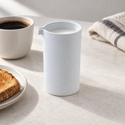 Loveramics Carrara Coffee Jug — 300 mL — styled use illustration; props and additional pieces excluded 7; AI-assisted image
