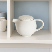 Loveramics Pro Tea Teapot — Speckled Lid — styled use illustration; props and additional pieces excluded 8; AI-assisted image