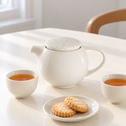 Loveramics Pro Tea Teapot — Speckled Lid — styled use illustration; props and additional pieces excluded 11; AI-assisted image