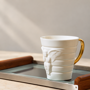 XIQI Arclight Bone China Mug — styled use illustration; props and additional pieces excluded 7; AI-assisted image