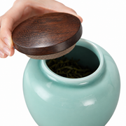 Shang Tang Rounded Celadon Tea Canister — white-background product view 3; AI-assisted image