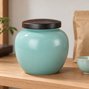 Shang Tang Rounded Celadon Tea Canister — styled use illustration; props and additional pieces excluded 10; AI-assisted image