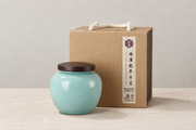 Shang Tang Rounded Celadon Tea Canister — styled use illustration; props and additional pieces excluded 11; AI-assisted image