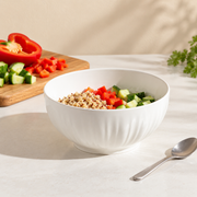 MDZF Ivory Fluted Serving Bowl — styled use illustration; props and additional pieces excluded 10; AI-assisted image