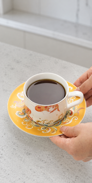 Taoxichuan Koi Cup & Saucer — styled use illustration; props and additional pieces excluded 8; AI-assisted image