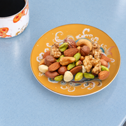 Taoxichuan Koi Cup & Saucer — styled use illustration; props and additional pieces excluded 9; AI-assisted image