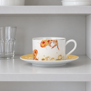 Taoxichuan Koi Cup & Saucer — styled use illustration; props and additional pieces excluded 10; AI-assisted image