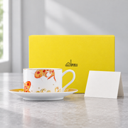 Taoxichuan Koi Cup & Saucer — styled use illustration; props and additional pieces excluded 12; AI-assisted image