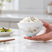 Taoxichuan Magnolia Rice Bowl — styled use illustration; props and additional pieces excluded 7; AI-assisted image