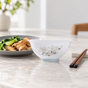 Taoxichuan Magnolia Rice Bowl — styled use illustration; props and additional pieces excluded 10; AI-assisted image