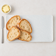 DXC Rock-Texture Serving Platter — styled use illustration; props and additional pieces excluded 7; AI-assisted image