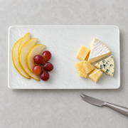 DXC Rock-Texture Serving Platter — styled use illustration; props and additional pieces excluded 9; AI-assisted image