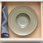 DXC Gray-Olive Ringed Deep Plate — styled use illustration; props and additional pieces excluded 11; AI-assisted image
