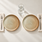 DXC Cream Reactive-Glaze Dinner Plate — styled use illustration; props and additional pieces excluded 11; AI-assisted image