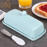 Ciray Light Blue Covered Butter Dish — styled use illustration; props and additional pieces excluded 8; AI-assisted image
