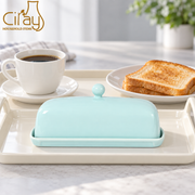 Ciray Light Blue Covered Butter Dish — styled use illustration; props and additional pieces excluded 9; AI-assisted image