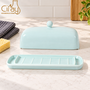 Ciray Light Blue Covered Butter Dish — styled use illustration; props and additional pieces excluded 10; AI-assisted image