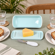 Ciray Light Blue Covered Butter Dish — styled use illustration; props and additional pieces excluded 11; AI-assisted image