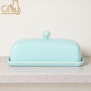 Ciray Light Blue Covered Butter Dish — styled use illustration; props and additional pieces excluded 12; AI-assisted image