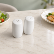 Rollin White Salt & Pepper Shakers — Pair — styled use illustration; props and additional pieces excluded 7; AI-assisted image