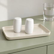 Rollin White Salt & Pepper Shakers — Pair — styled use illustration; props and additional pieces excluded 10; AI-assisted image