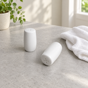 Rollin White Salt & Pepper Shakers — Pair — styled use illustration; props and additional pieces excluded 12; AI-assisted image