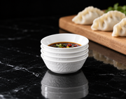 SONGFA White Dinnerware Set — 28 Pieces — styled use illustration; props and additional pieces excluded 10; AI-assisted image
