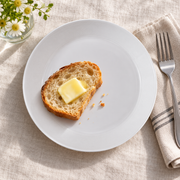 SONGFA White Dinnerware Set — 28 Pieces — styled use illustration; props and additional pieces excluded 11; AI-assisted image