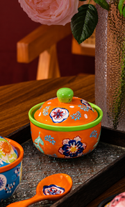 SONGFA Orange Lidded Pot — 400 mL — styled use illustration; props and additional pieces excluded 7; AI-assisted image