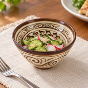 AI-assisted illustration of Bamboo Scroll Rice Bowl — Ivory & Umber, pickles table setting; food and styling props are not included.
