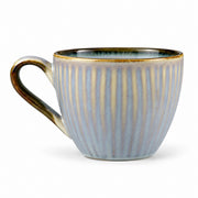 AI-assisted illustration of Mist Blue Ribbed Coffee Cup, catalog left profile view. Saucer is not included.