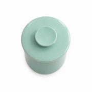 AI-assisted illustration of Mint French Butter Keeper, catalog overhead view.