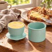 AI-assisted illustration of Mint French Butter Keeper, toast breakfast setting; food and styling props are not included.