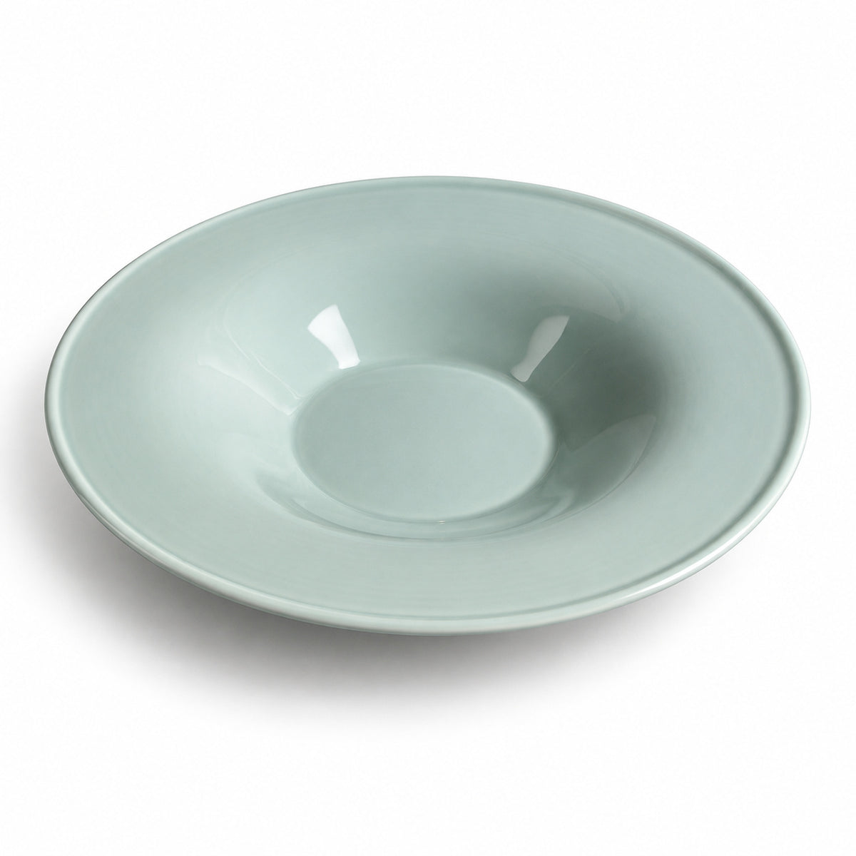 AI-assisted illustration of Sage Wide-Rim Pasta Plate, angled catalog view.
