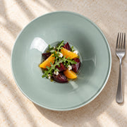 AI-assisted illustration of Sage Wide-Rim Pasta Plate, roasted beet salad setting; food and styling props are not included.