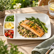 AI-assisted illustration of Ivory Four-Compartment Plate, balcony meal setting; food and styling props are not included.